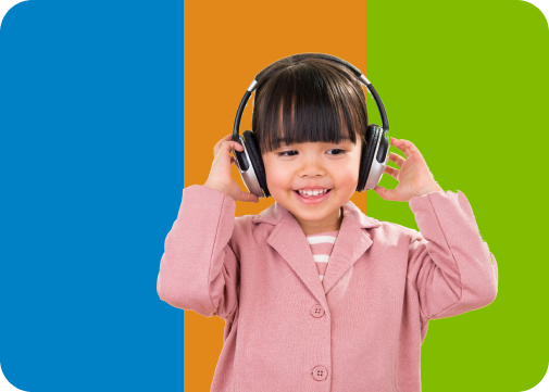 Small girl listening to music on headphones and smiling on a blue, orange, and green background.
