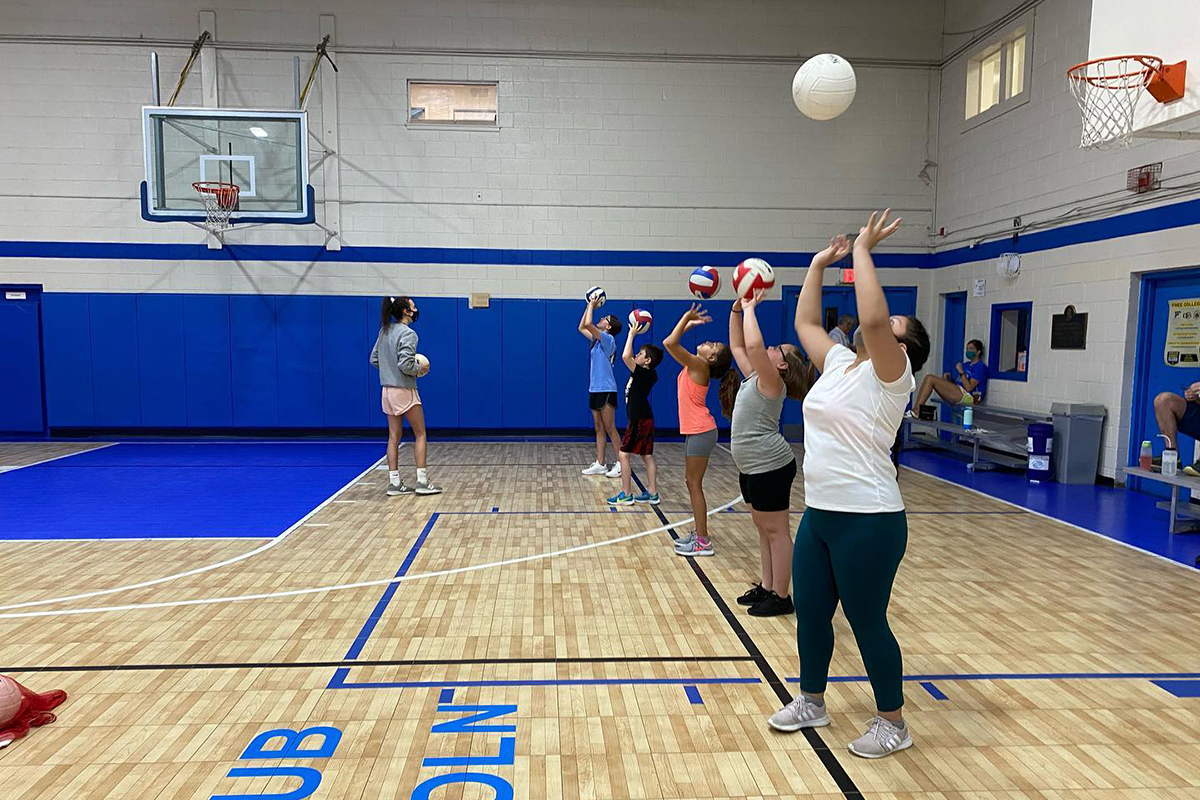 Girls training for volleyball